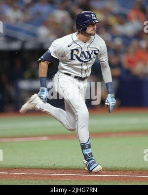 Tampa Bay Rays' Josh Lowe, left, scores on a bases-loaded walk to Ji ...