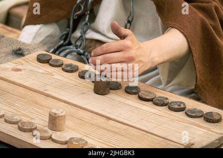 Ludus Latrunculorum, or Latrunculi, is an ancient Roman strategy game. Reconstruction of board games from the Roman Empire Stock Photo