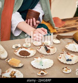 Ancient Roman cosmetics, retro perfume and vintage bath accessories. Reconstruction of events in the thermae of the Roman Empire Stock Photo