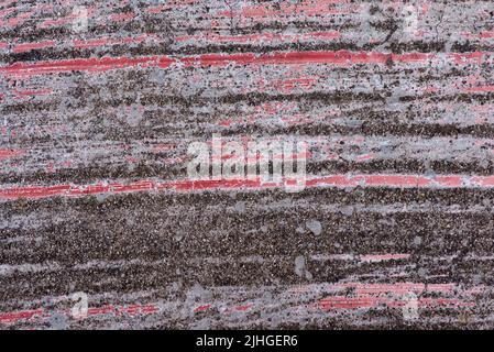 The red color stain on the concrete wall Stock Photo