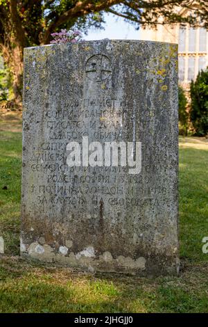 Georgi Markov gravestone in cemetery with Cyrillic script, Bulgarian dissident, Whitchurch Canonicorum churchyard, Dorset, England, UK Stock Photo