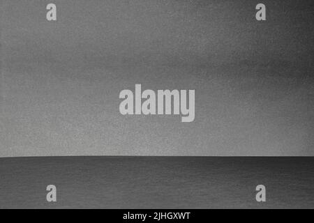Empty rough gray studio space with deep shadows. Minimalistic space concept Stock Photo