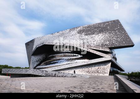 Paris, France - May 4, 2022: View of Paris Philharmonic (Philharmonie de Paris) and facade details in Parc de la Villette. Designed by Jean Nouvel. Co Stock Photo