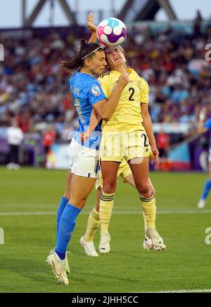 Italy's Agnese Bonfantini (left) and Belgium’s Davina Philtjens battle for the ball during the UEFA Women's Euro 2022 Group D match at the Manchester City Academy Stadium, Manchester. Picture date: Monday July 18, 2022. Stock Photo