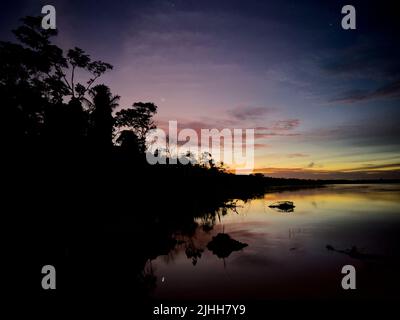 Sunrise over the Amazon of Peru shot in night mode on the iphone 13 Stock Photo