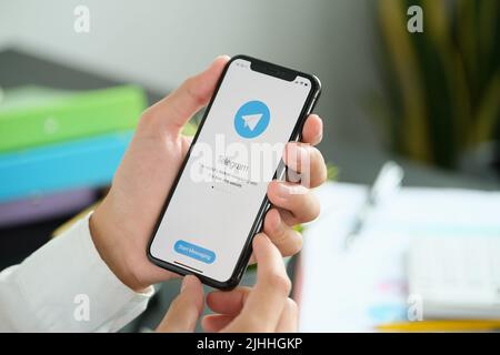 CHIANG MAI, THAILAND April 06 2021 : Telegram application icon on Apple iPhone screen close-up. Telegram app icon. Telegram is an online social media Stock Photo
