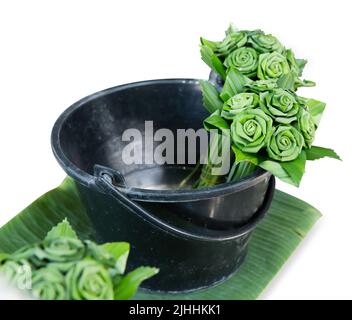 Die cut of make a Pandan leaf roses on white isolated. Stock Photo