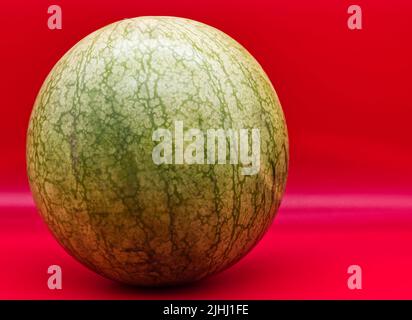 Fresh Watermelon isolated on red background. Fresh summer fruit. Stock Photo