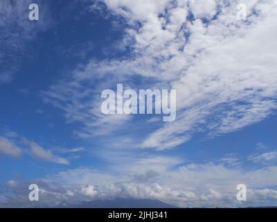 blue sky with dramatic white clouds Stock Photo