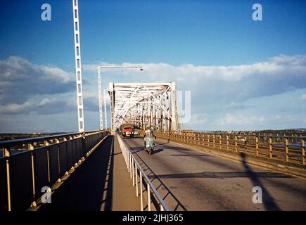 Road and railway lines, Little Belt Bridge, Old Lillebælt Bridge truss bridge completed 1935, Den gamle Lillebæltsbro, Middelfart, Denmark 1958 Stock Photo