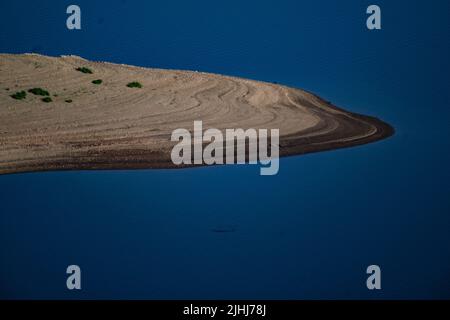 Waldeck, Germany. 19th July, 2022. View of an island in Lake Edersee in northern Hesse in the Kellerwald-Edersee National Park. The third largest reservoir in Germany is 46 percent full. Credit: Swen Pförtner/dpa/Alamy Live News Stock Photo