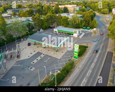 Aerial view of BP petrol station showing high UK fuel price sign Stock Photo