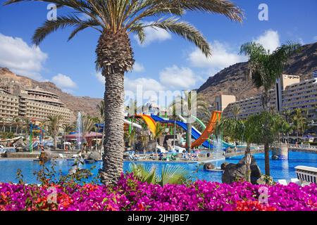 Hotel pool with water slides, hotel in Taurito, Grand Canary, Canary islands, Spain, Europe Stock Photo