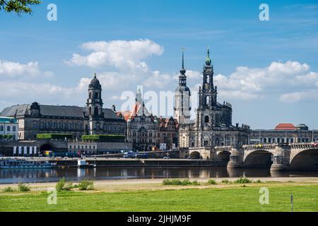 Dresden, Germany, May 2022 View over the Elbe meadows to the baroque buildings of the castle and the catholic castle church Stock Photo