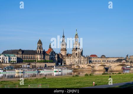 Dresden, Germany, May 2022 View over the Dresden Elbe meadows to the backdrop of the castle and the castle church and the Augustus Bridge Stock Photo