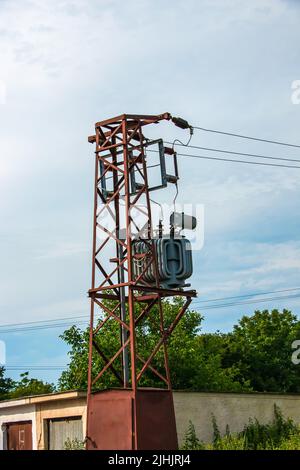 Medium voltage power tower and transformer substation. Used by small consumers and small industry. Stock Photo