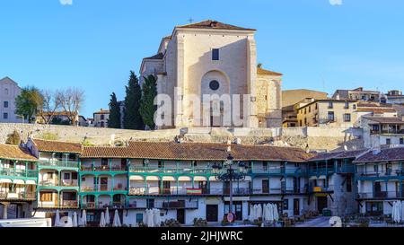 Large medieval church in an old town in Spain, located above the houses in the town's central square. Chichon, Madrid. Stock Photo