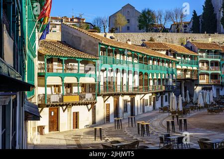 Central square of the town of Chinchon in Madrid, typical houses with wooden balconies and an old medieval atmosphere. Stock Photo