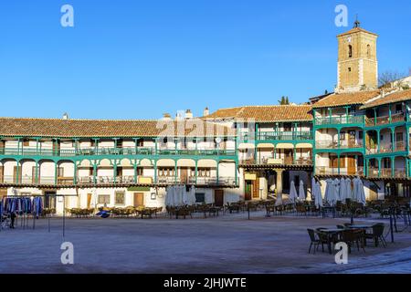 Central square of the town of Chinchon in Madrid, typical houses with wooden balconies and an old medieval atmosphere. Stock Photo