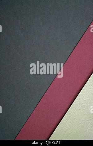 Paper background divided by a diagonal. Abstract soft pastel colored empty space for text idea banner billboard. Sheets of black dark red paper. Trend Stock Photo