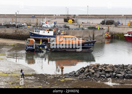 Training exercise launch of Shannon Class Lifeboat RNLB 13-36 John and Elizabeth Allan at Seahouses Harbour, North Sunderland, England Stock Photo