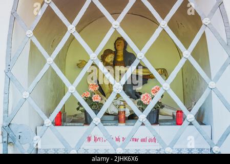 Small niche with religious images that show the faith of the region's population. Collalbo, Klobenstein in German, is a fraction, and seat of the town Stock Photo