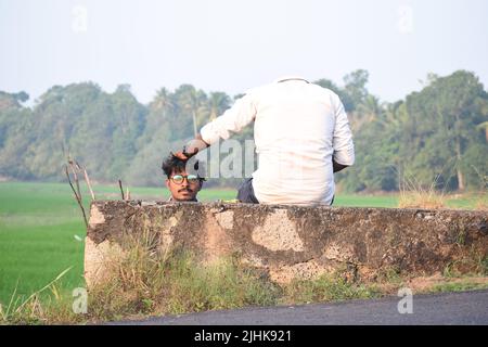 Two young men posing for photo in a creative way. Concept- creative photography Stock Photo
