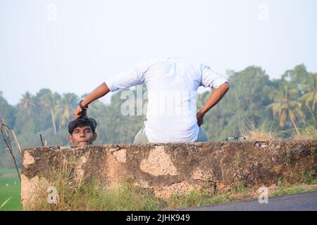 Two young men posing for photo in a creative way. Concept- creative photography Stock Photo