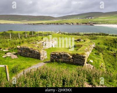 The ancient chapel on St Ninian's Isle, Shetland, Scotland, UK with the best example in the UK of a tombolo, the beach, connecting an island and the m Stock Photo