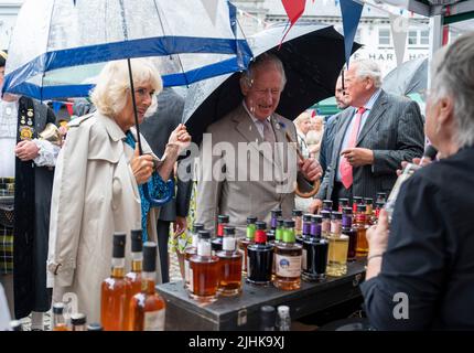 The Prince of Wales and the Duchess of Cornwall visit the Market Square during a visit to Launceston in Cornwall on the second day of their annual visit to the South West. Picture date: Tuesday July 19, 2022. Stock Photo