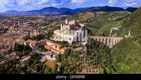 Heritage of Italy and  ancient landmarks of Umbria . impressive Spoleto town aerial view of castle Rocca Albornoz and splendid roman bridge Ponte dell Stock Photo