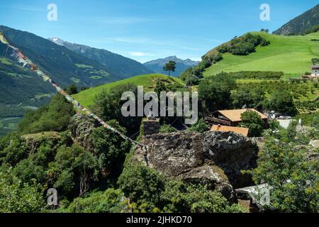 View of Juval Castle, summer residence & museum of Italian mountaineer Reinhold Messner, above the village of Naturns, South Tyrol, Italy. Stock Photo