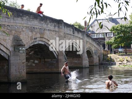 Leicester, Leicestershire, UK. 19th July2022. UK weather. A youth jumps into the River Soar in Abbey Park during record breaking hot weather. The UK has recorded a temperatures of over 40C (104F) for the first time. Credit Darren Staples/Alamy Live News. Stock Photo