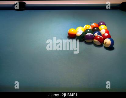 Close up of pool billiards balls on  pool table with setup position and copy space. Stock Photo