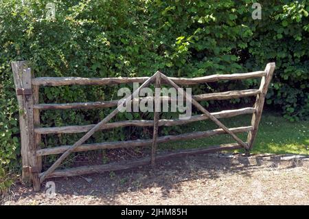 Wooden rustic five barred gate, St Fagans National Museum of History, Museum, Cardiff, Wales. Summer 2022. July Stock Photo