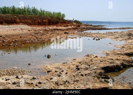 landscape of the beach at Pescoluse, also known as Salento Maldives, in Apulia region, Italy Stock Photo