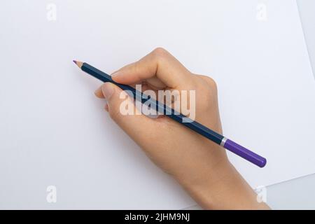 Various colored pencils on a white background Stock Photo