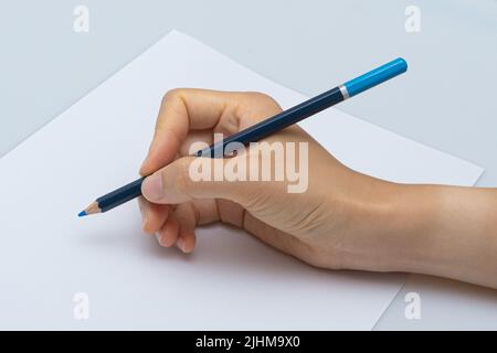 Various colored pencils on a white background Stock Photo