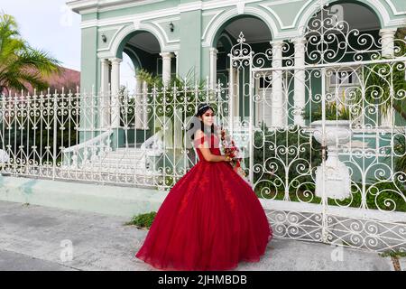 Girl celebrating her quinceañera (celebration of a girl's 15th birthday) Mexico Stock Photo