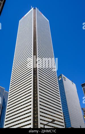 Bank of Montreal (BMO) building towering next to Ernst & Young (EY) office building seen from Bay Street, downtown Toronto, Ontario, Canada. Stock Photo