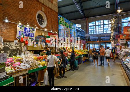 Inside St. Lawrence Market with fruit and vegetable stalls in downtown Toronto, Ontario, Canada. Stock Photo
