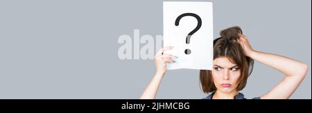 Thinking woman. Concept - challenging issue, looking for the answer. Isolated girl. Woman with doubtful expression and question marks. Question mark Stock Photo