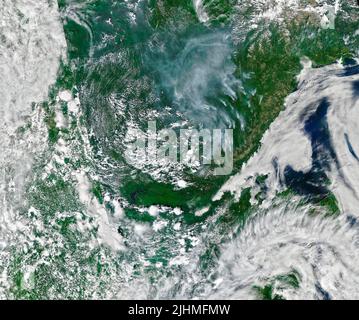 A satellite image showing smoke from wildfires burning in Siberia in the Russian far east picked up by the NASA-NOAA Suomi NPP satellite, July 4, 2022, in Earth Orbit. Stock Photo