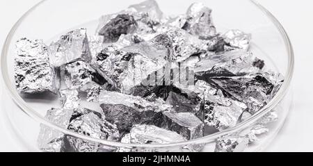 Chromium, a metallic chemical element, is an essential transition metal for the manufacture of stainless steel, or chrome pigments. Stock Photo