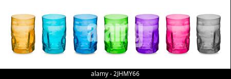 Modern drinking glasses of different colors set. Isolated on a white background Stock Photo