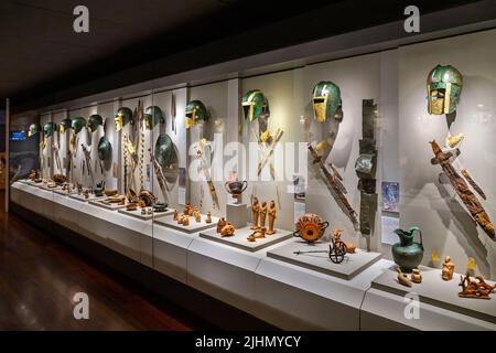 The golden burial masks and armors of ancient Macedonian warriors, are the most impressive exhibits in the Museum of Pella, Macedonia, Greece. Stock Photo