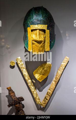 The golden burial masks and armors of ancient Macedonian warriors, are the most impressive exhibits in the Museum of Pella, Macedonia, Greece. Stock Photo