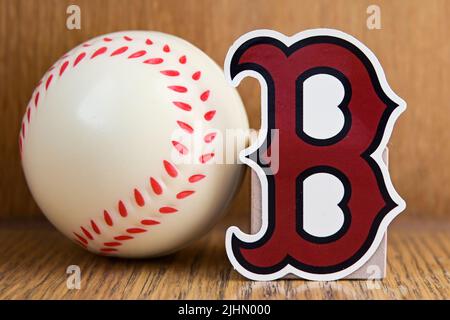 July 19, 2022, Cooperstown, New York. Emblem of the Boston Red Sox baseball club and baseball. Stock Photo