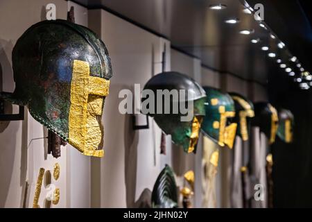 The golden burial masks and armors of ancient Macedonian warriors, are the most impressive exhibits in the Museum of Pella, Macedonia, Greece. Stock Photo