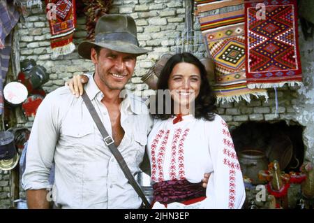 HARRISON FORD, KAREN ALLEN, RAIDERS OF THE LOST ARK, 1981 Stock Photo